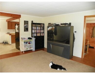 Living Room. The living room has a...