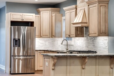 Granite counters with a counter bar for that cup of jo in the morning.