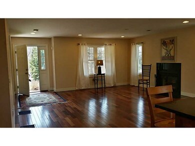 Living Room. Hardwood floors, well lit with 3 side