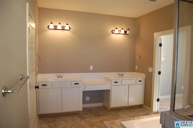 Raised Custom Cream Cabinets