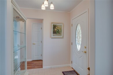 Foyer area with beautiful door