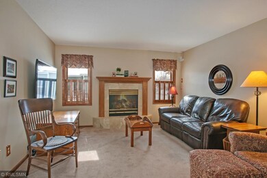 Main floor living room with gas fireplace.