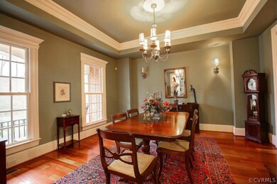 The stunning Formal Dining Room with Tray Ceiling,