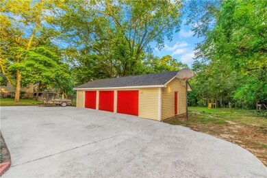 View of the 3 car Carriage house with plenty of st
