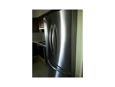 Front Exterior. NEW STAINLESS FRIDGE