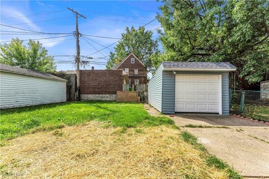 Garage featuring a yard
