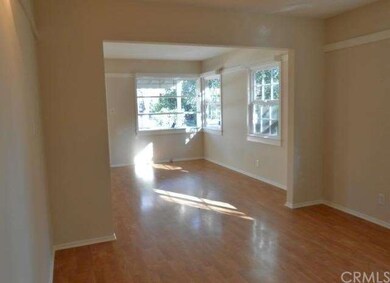Formal dining area looking onto the living room.