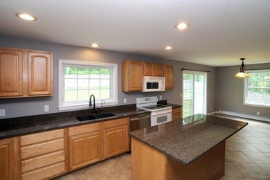 Tile and granite with ample center...