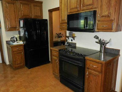 Kitchen. Newer range and microwave