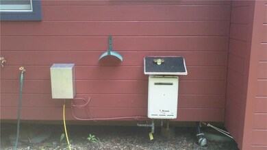 Out side tank less water heater....