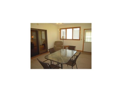 Porch. Bright, spacious three seasons room adds li