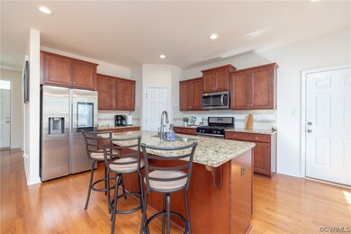 Kitchen featuring stainless steel appliances, ligh