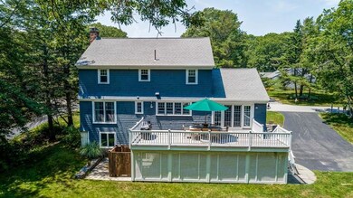 Back of home with over sized deck...