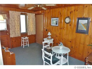 Other Heated mudroom or den space with access to t