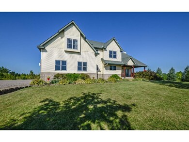 Stately two story nestled on 4.84 acres.