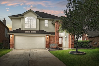 This two-story home in the sought-after Windrose c