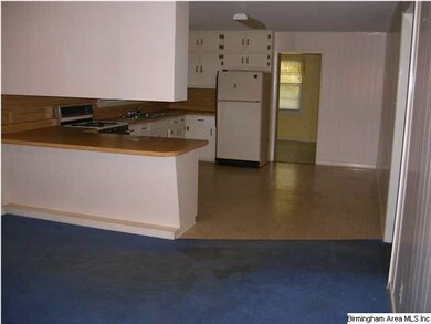 Open kitchen and eating area.