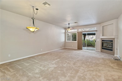 Living Room with fireplace and dining area with ha