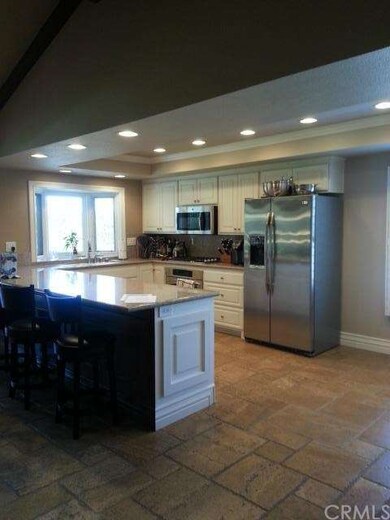 Spacious Kitchen with Bar and Breakfast Room.  Sta