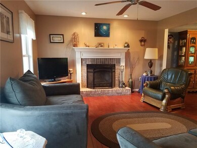 Living room with Wood or Propane burning fireplace