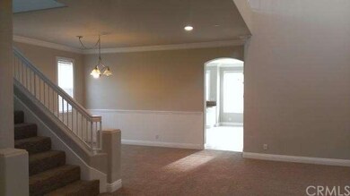 Entry view to living room and dining area 