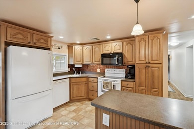 7937 Carlson Rd, Lansing, MI 48917 - photo 4