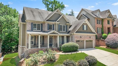 Craftsman inspired home featuring brick siding, a porch, concrete driveway, a garage, and roof with shingles