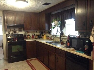 kitchen with beautiful cabinets and new appliances.