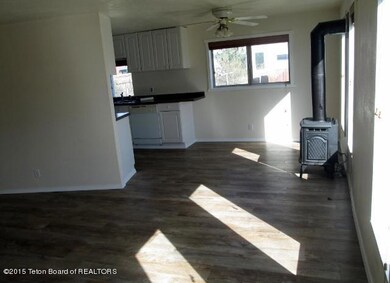 Livingroom towards dining/kitchen