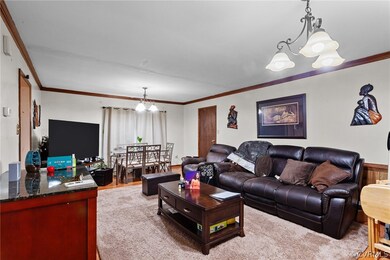 Living room featuring hardwood / wood-style floori
