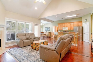 Additional view of the large living room with vaul