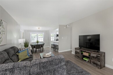 Living area featuring wood finished floors and baseboards