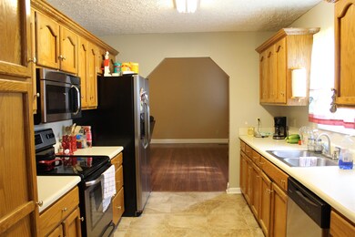 Kitchen view into living room.