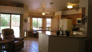 Living Area towards Kitchen and Outdoors