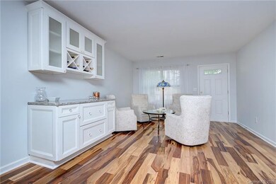 Custom built-in cabinet with glass knobs in living