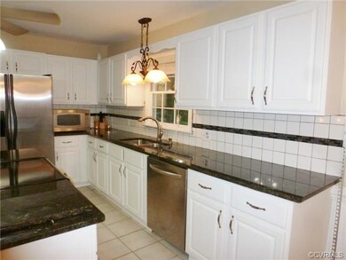 Beautiful Tile Backsplash, new Kitchen faucet and 