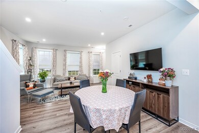 Dining area with light hardwood / wood-style floor