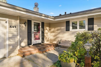 Front Entry. Concrete driveway and walks.