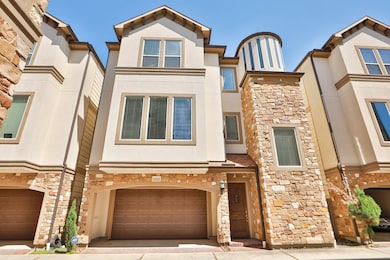 Stone and stucco exterior bring this freestanding