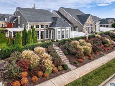 Fenced rear yard with community maintained landsca