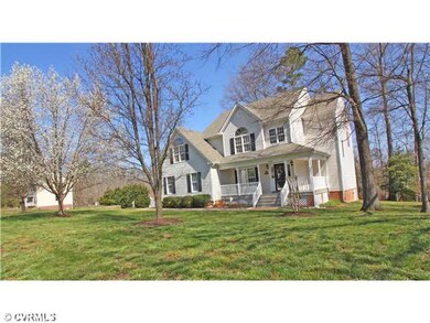 Exterior Front - Half acre lot with beautiful land