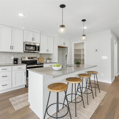 707 SW Glenn Cir, Raymore, MO 64083 - photo 3