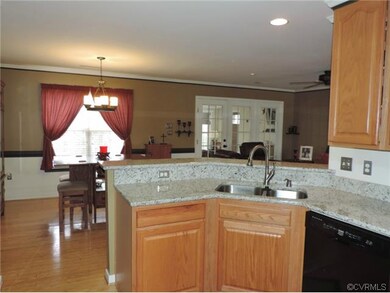 Updated kitchen features a hop-up bar for entertai
