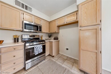 KITCHEN WITH NEW STAINLESS APPLIANCES