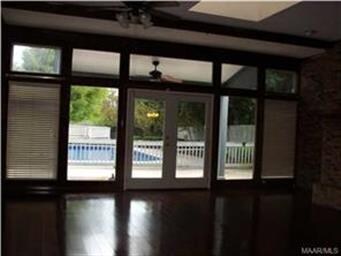 Great room with inviting view of swimming pool