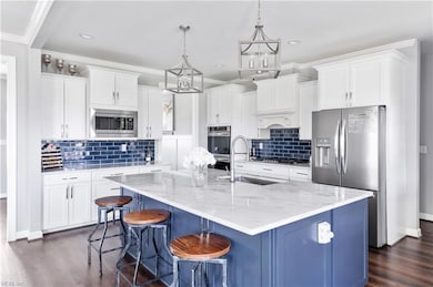 Stunning gourmet kitchen with subway tile, double 