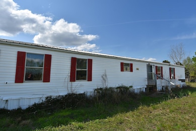 View of front facade with metal roof