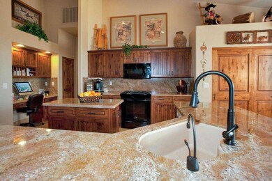 Awesome granite and Alder wood cabinets