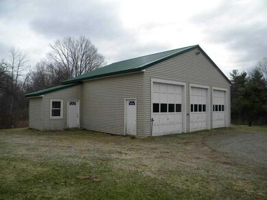 Garage. 3 bay garage, heated, with...