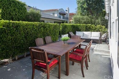 A large and lushly landscaped patio, perfect for p